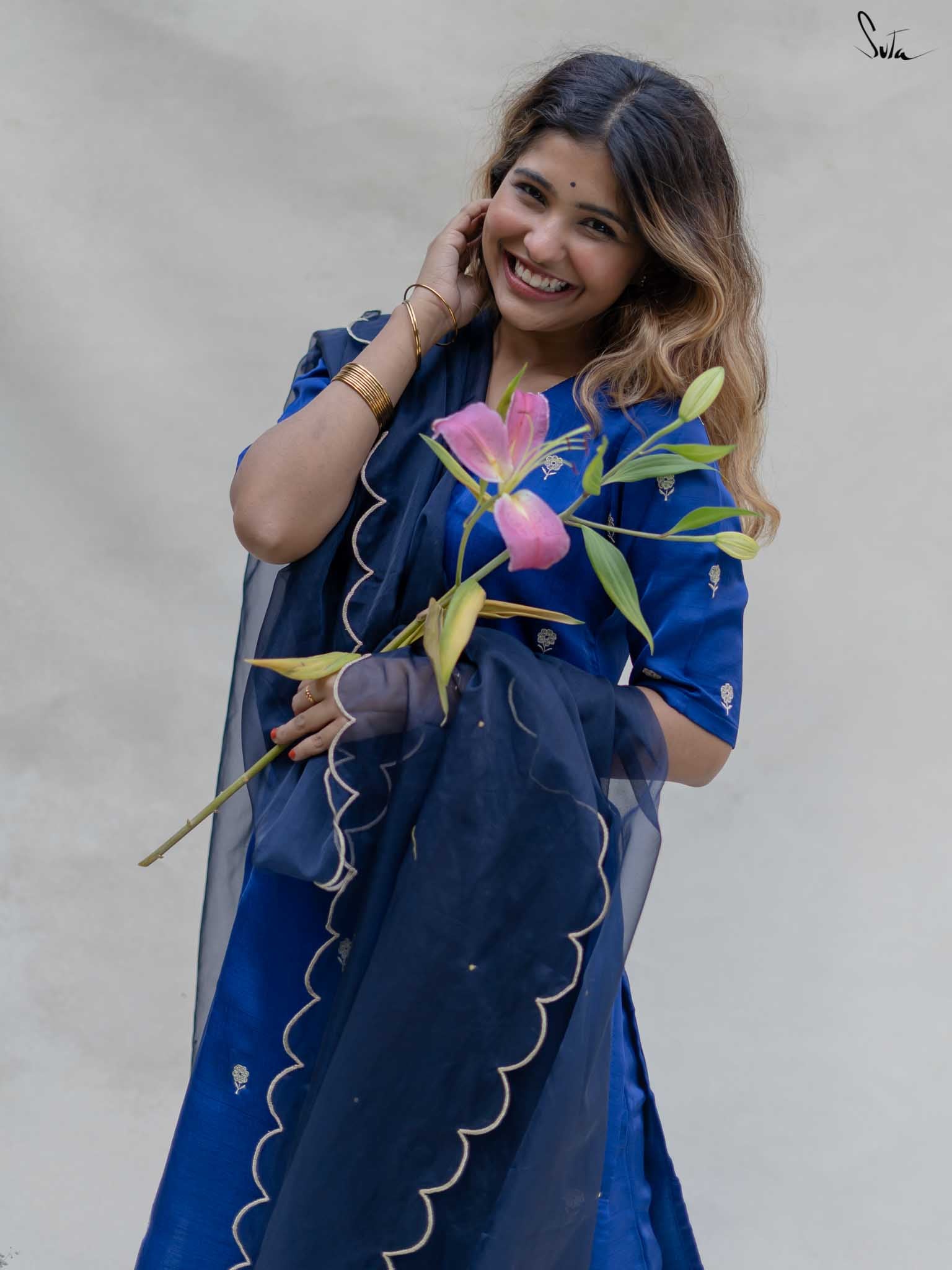 Neela Beli