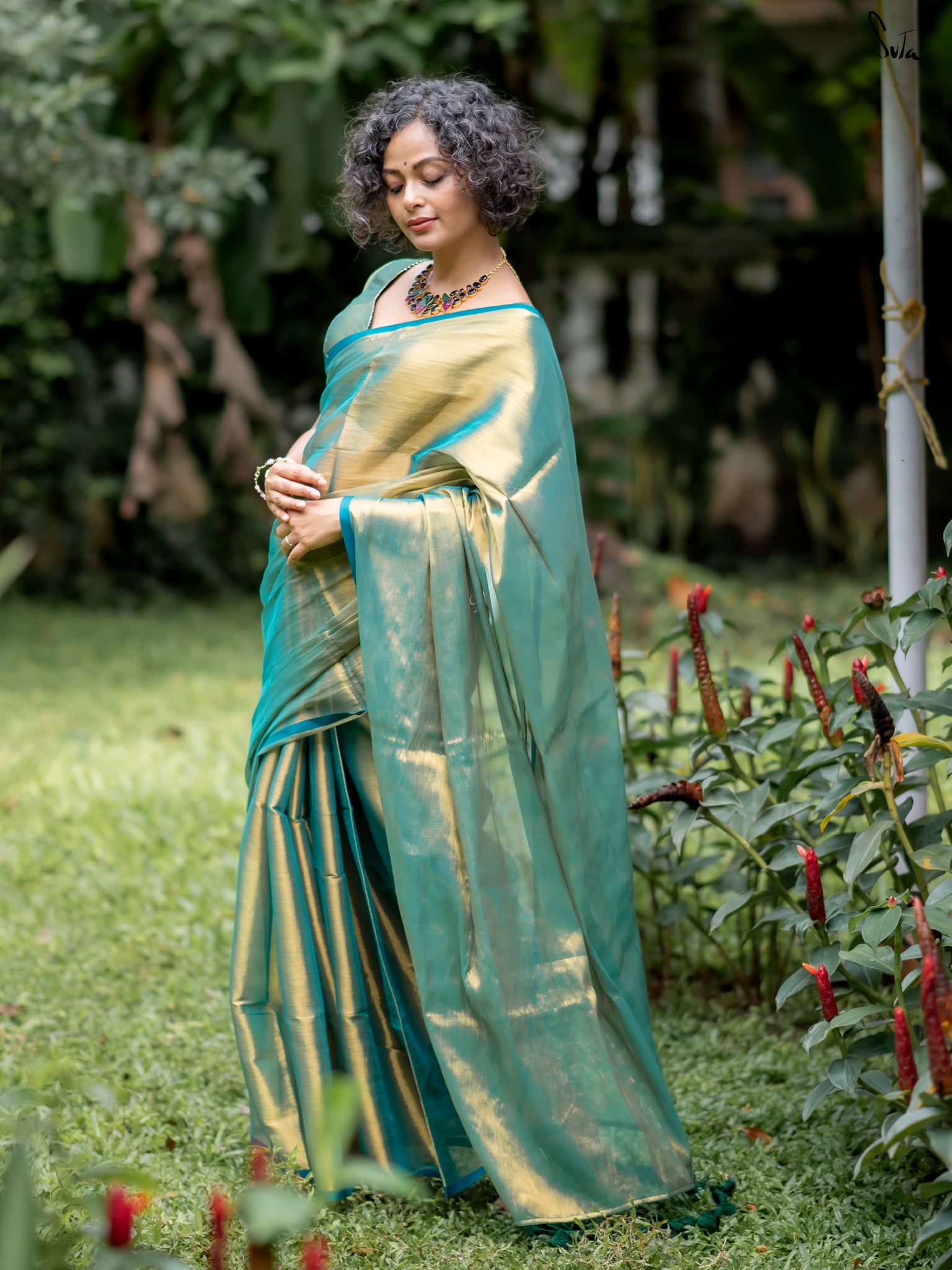 Suta Teal Tissue Saree
