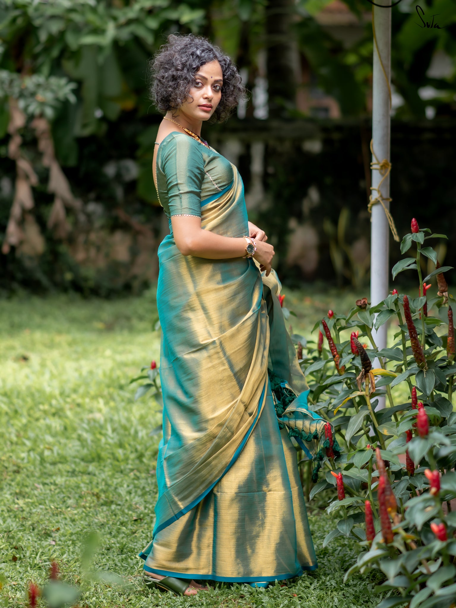 Suta Teal Tissue Saree