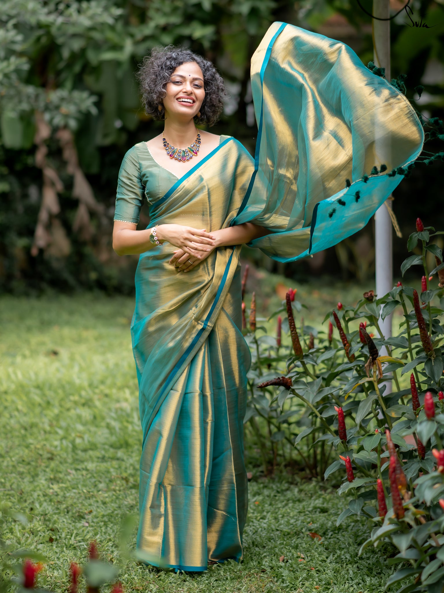 Suta Teal Tissue Saree