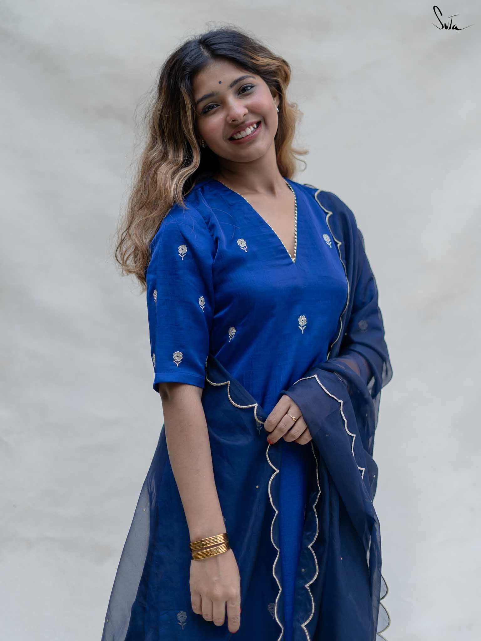 Neela Beli