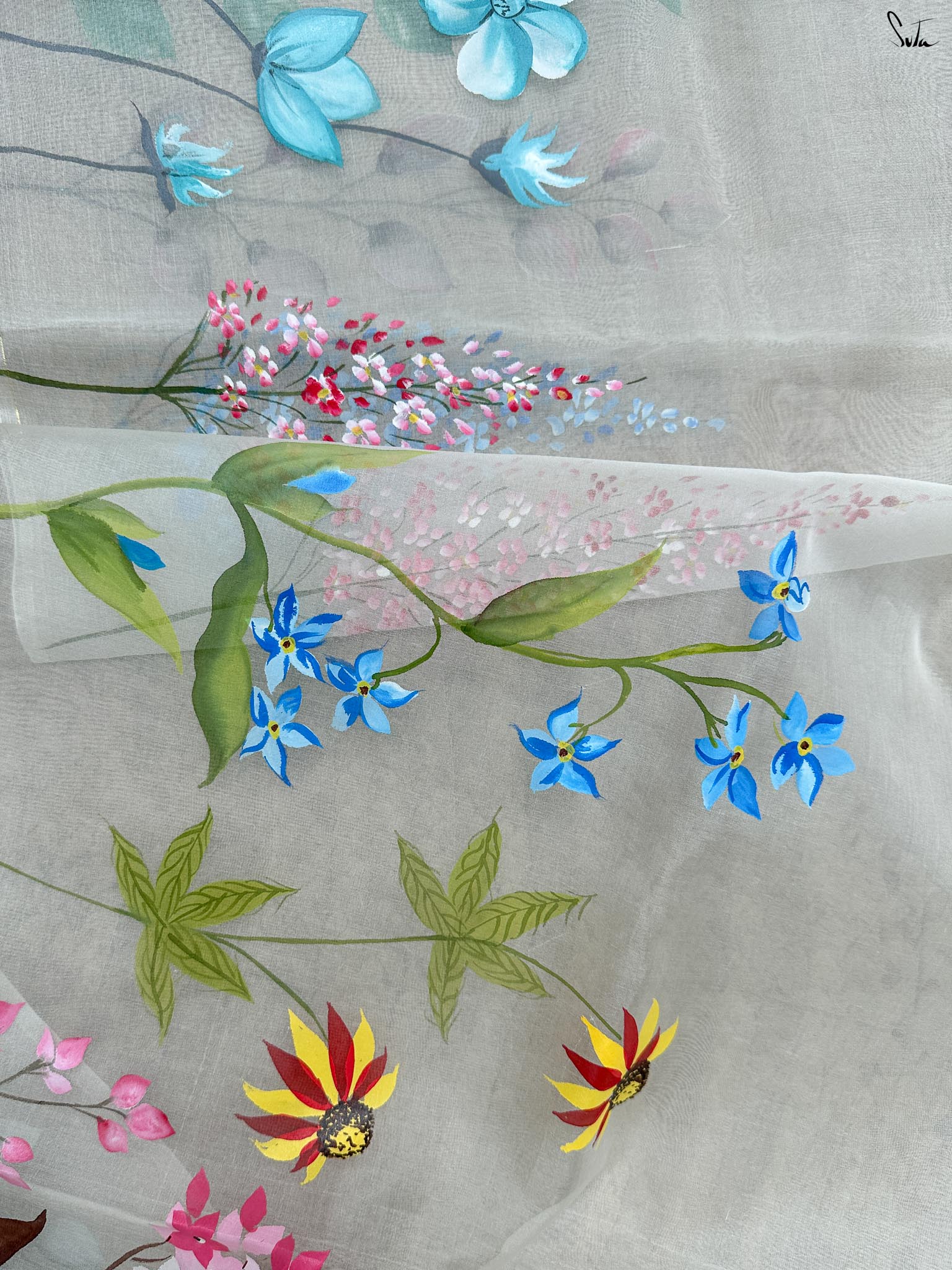 Floral Fiesta (Hand Painted Pure Organza Saree)