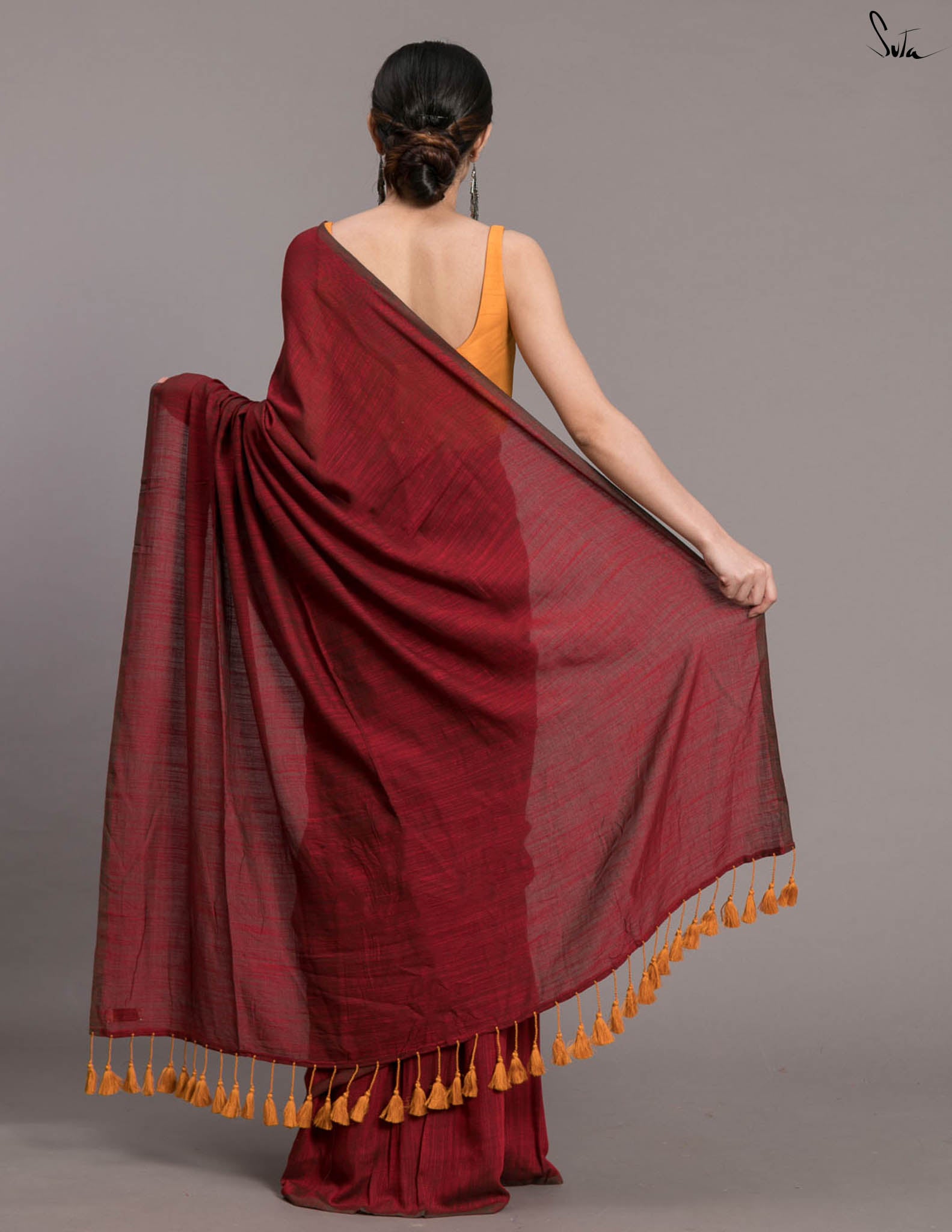 Suta Maroon Solid Cotton Blend Saree