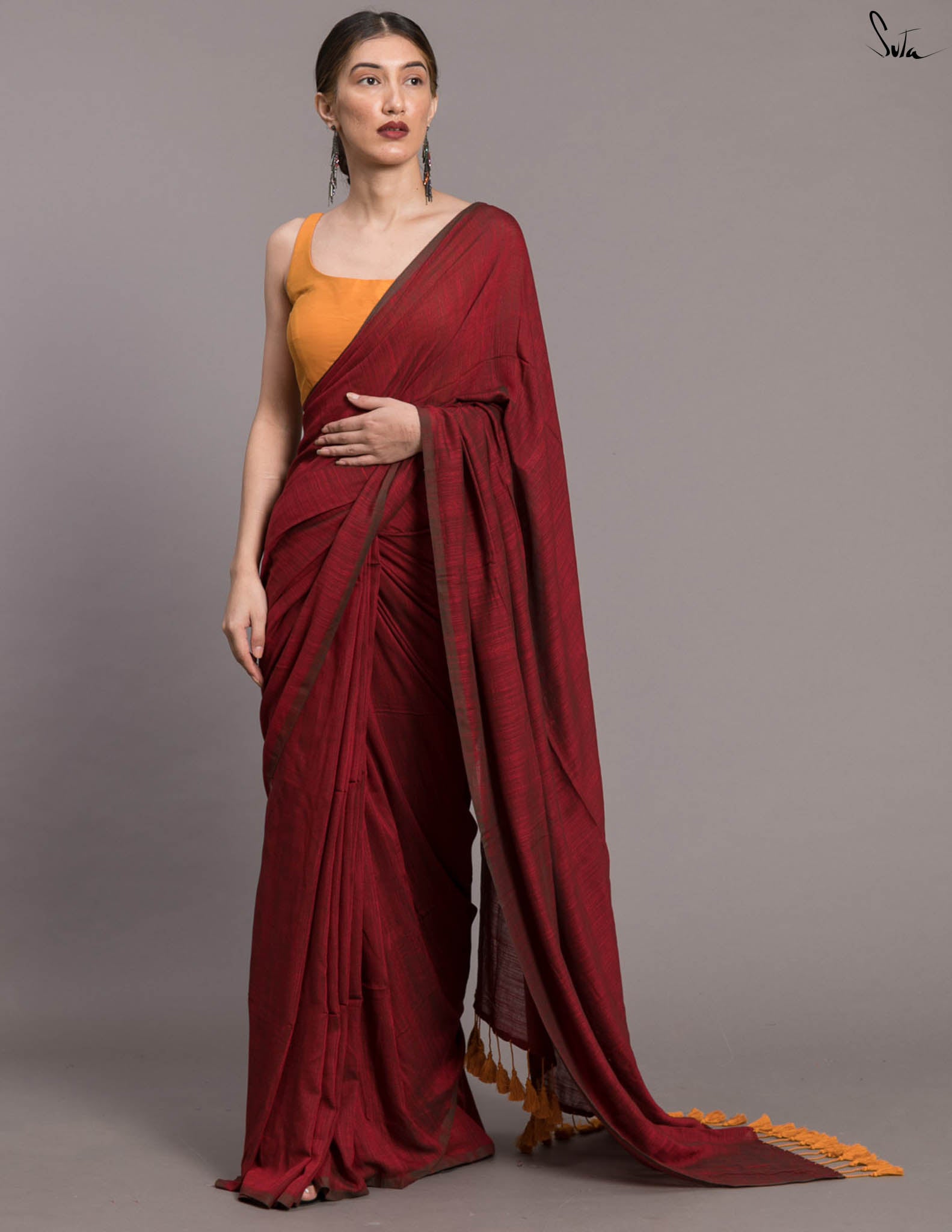 Suta Maroon Solid Cotton Blend Saree