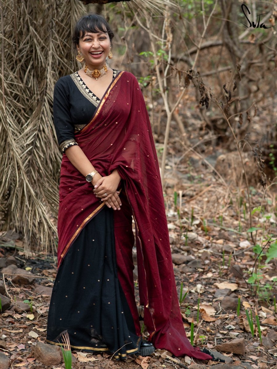 Reddish maroon silk cotton saree with contrast black peacock zari border  and marron pallu. Comes with contrast black blouse .. Normal ... | Instagram