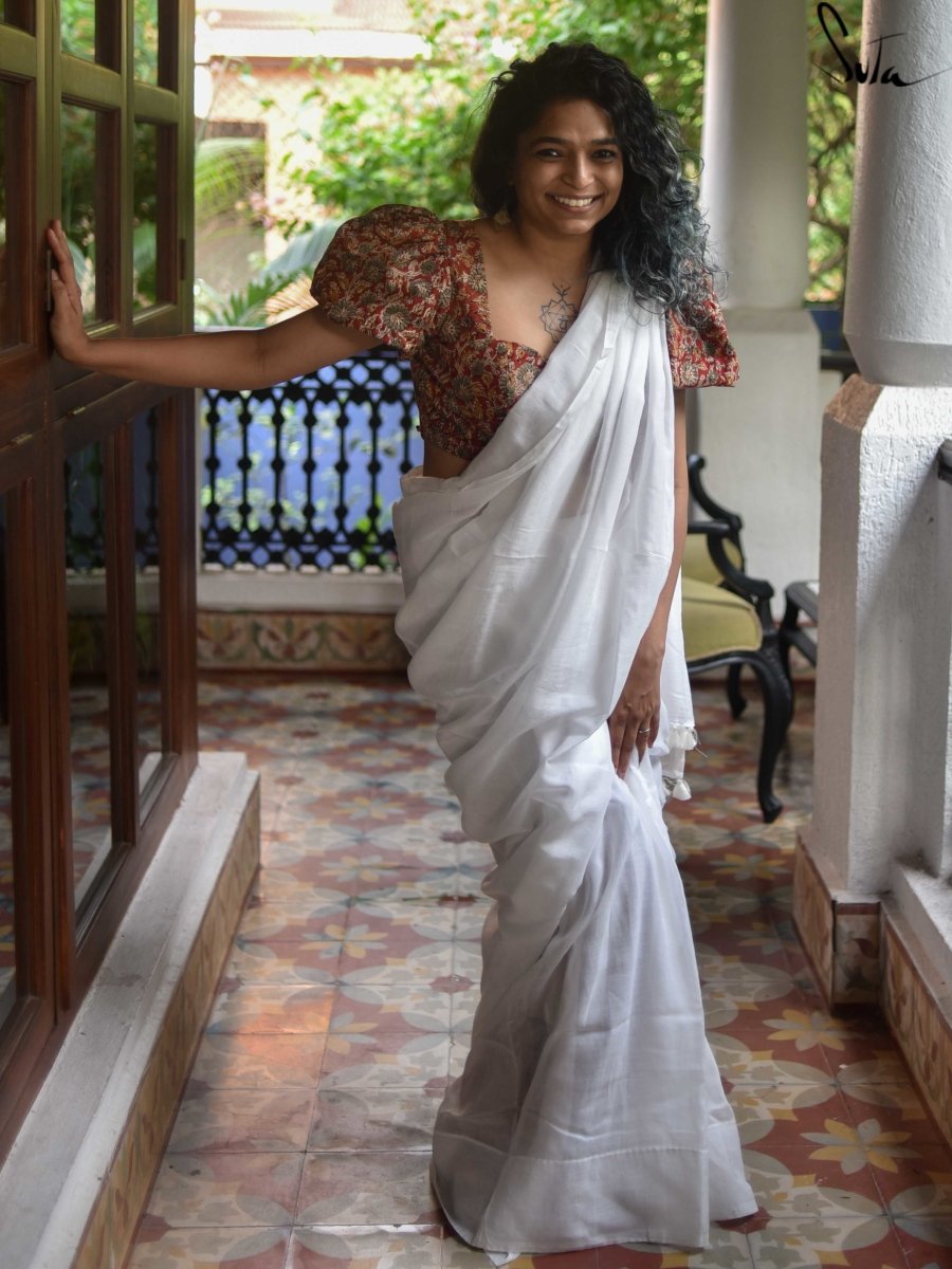 Mesmerizing White Plain Linen Saree with Golden Red Border Onam Special -  Loomfolks